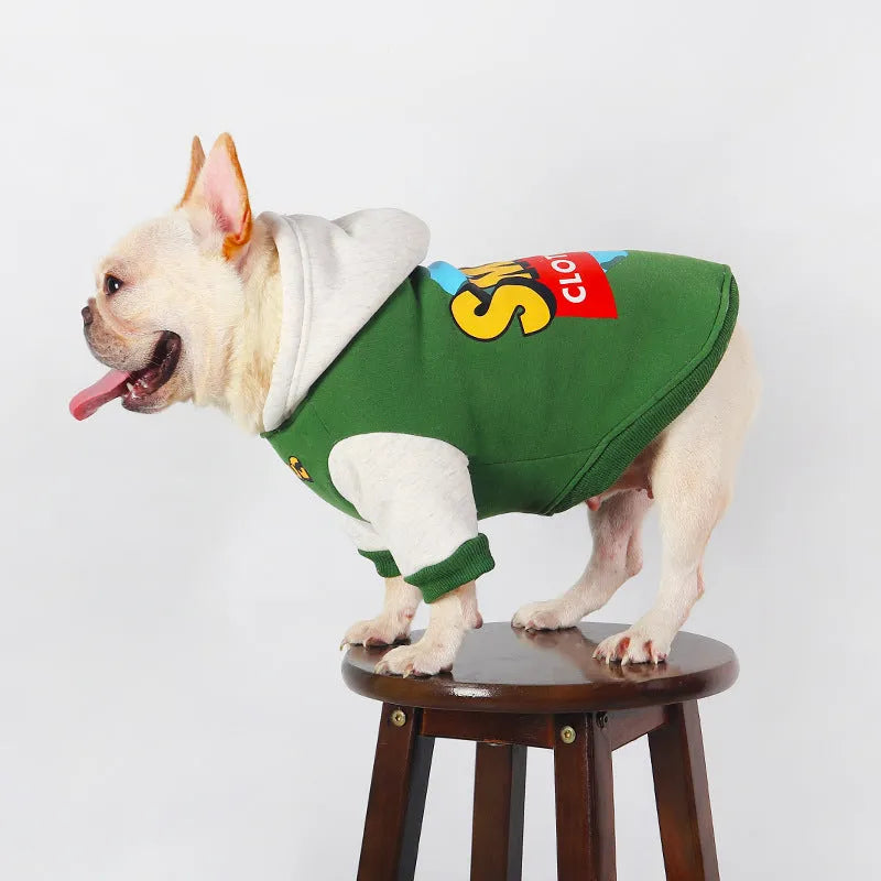 A green cotton dog jumper or sweater for large breeds, shown on a hanger.