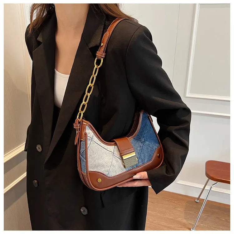 Brown denim women's shoulder bag with diamond mesh and chain details showing internal mobile phone pocket