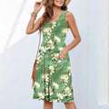 Sleeveless floral printed dress in polyester fabric for spring and summer.