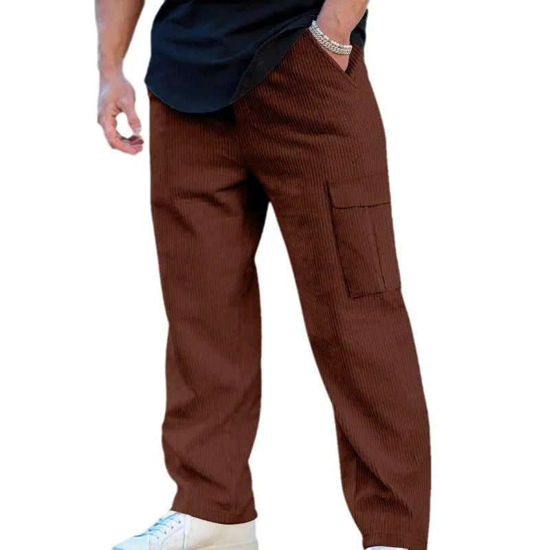 Men's loose-fitting corduroy cargo trousers in navy blue with straight wide-leg cut and elasticated waist