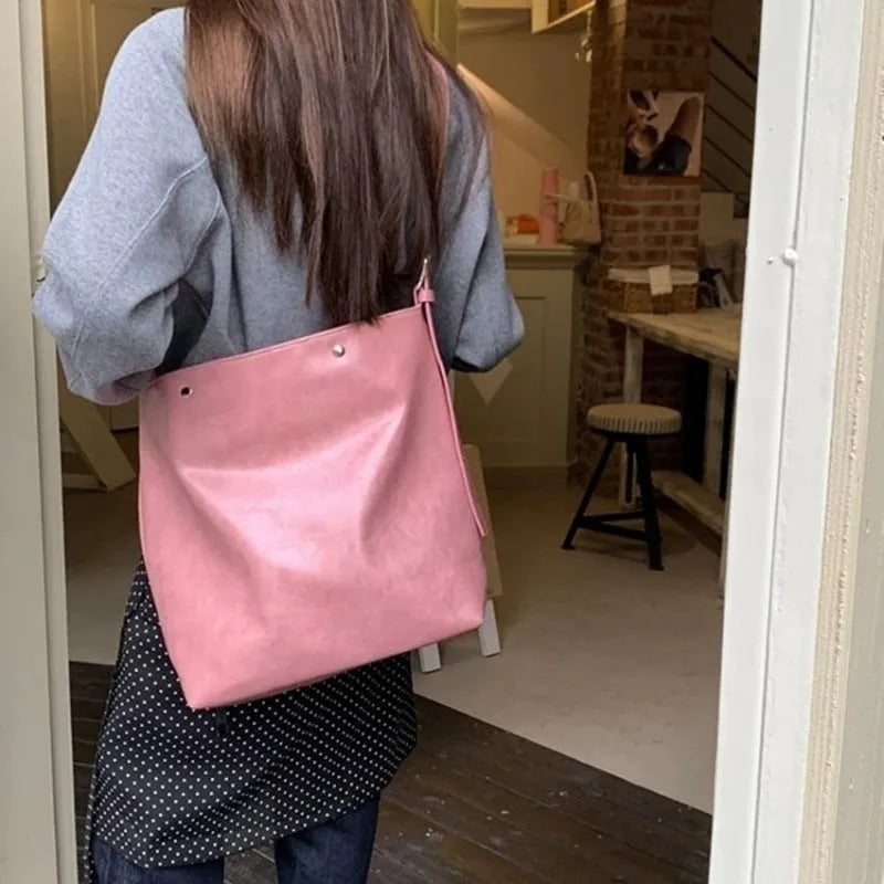 Corduroy single-shoulder commuter bag in pink or brown with PU lining, 39cm length