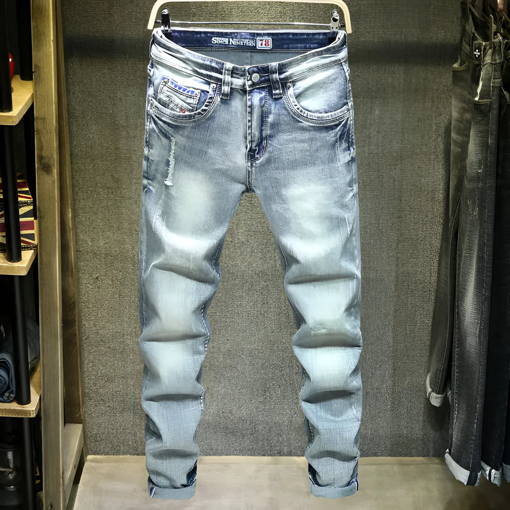 Men's light blue ripped casual jeans in cotton with distressed details, size 28 to 38