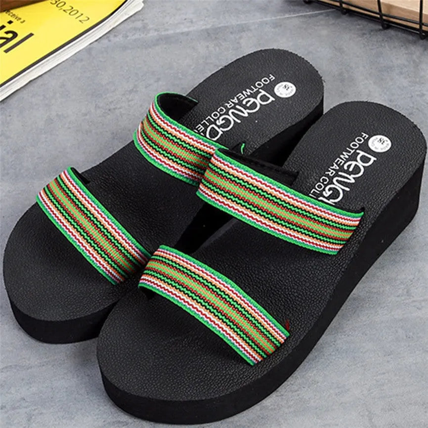 Women's brown bohemian summer slippers with elastic EVA upper and adjustable strap on a wooden floor.