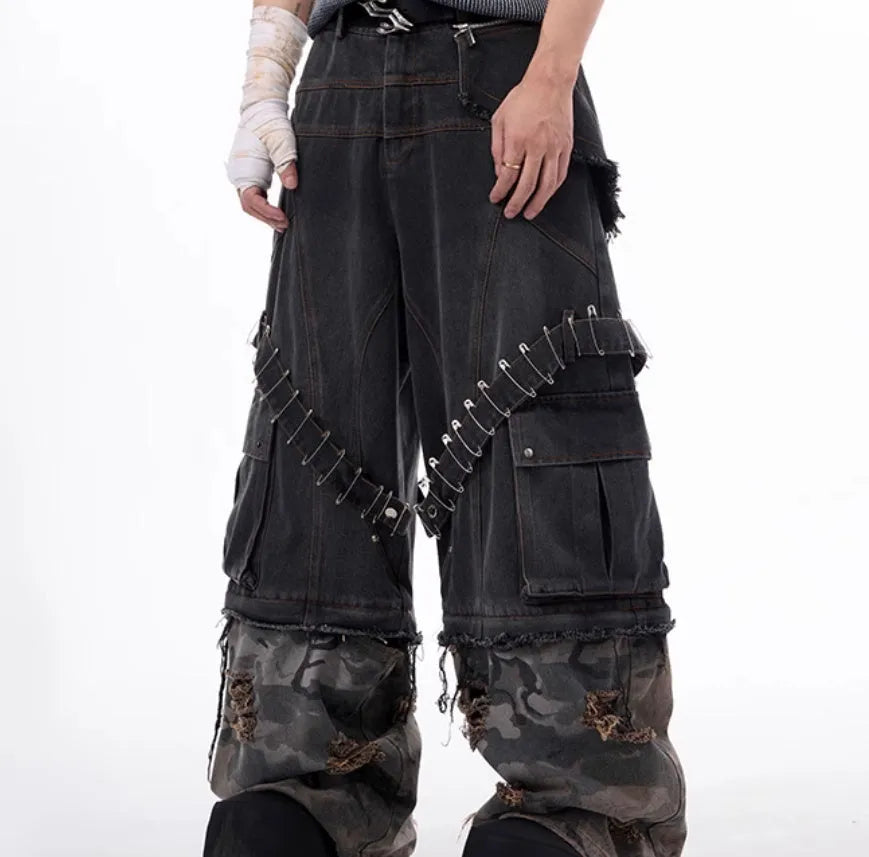 Men's grey camouflage jeans with pin and ribbon splicing detail on the legs.