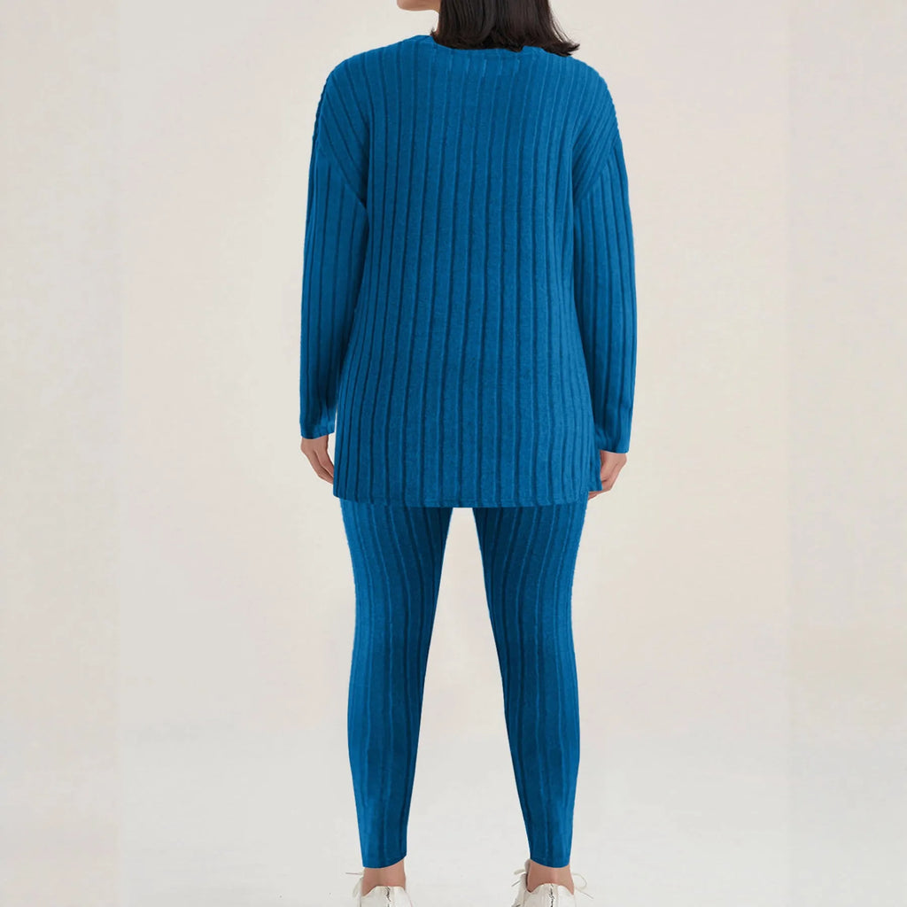 Women's black and blue sunken stripe patterned two-piece polyester homewear set with top and loose-fit pants.