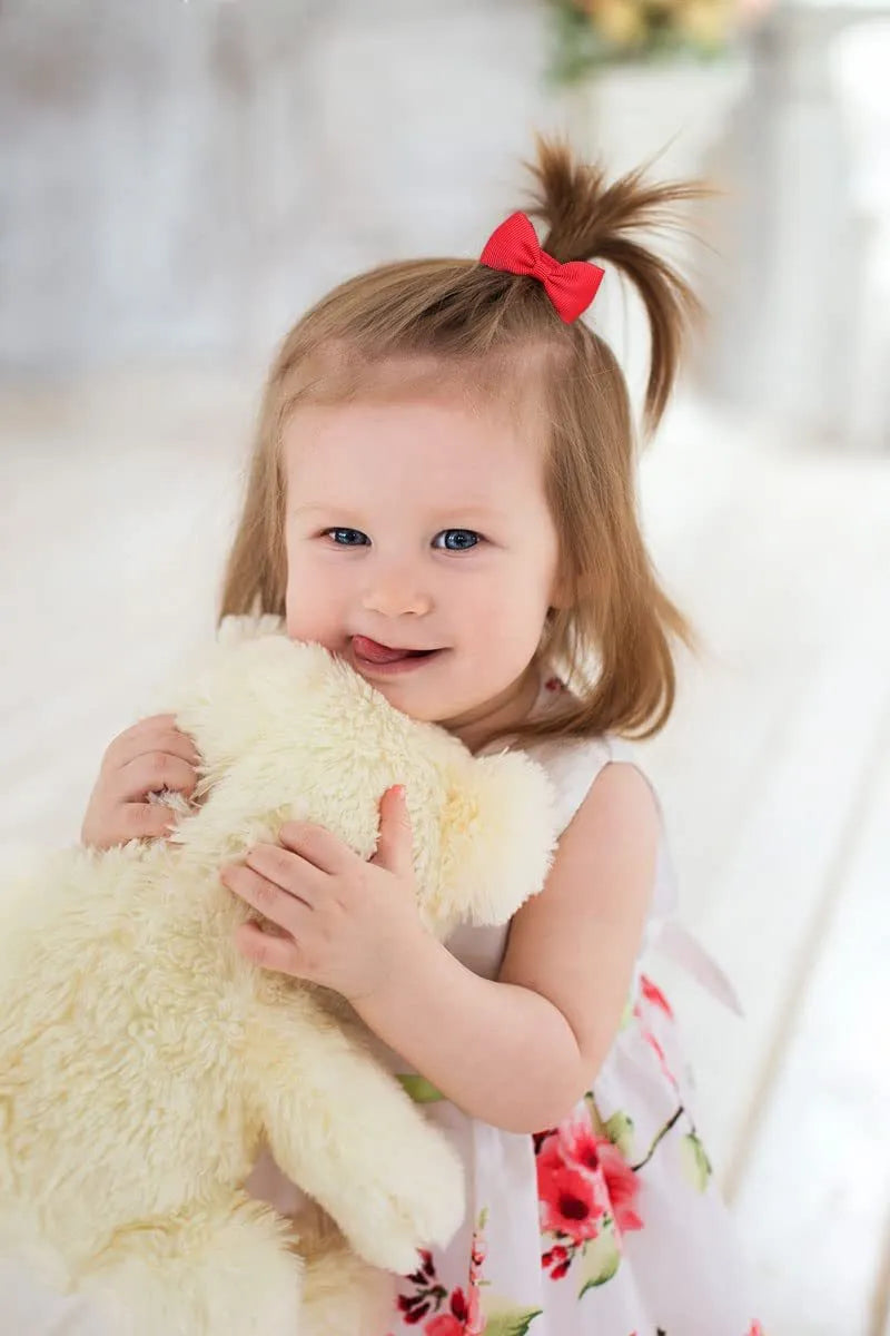 80 multi-coloured tiny hair ties with grosgrain ribbon bows for baby girls and toddlers.