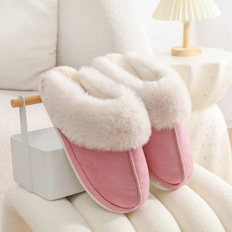 Women's brown plush indoor slippers with artificial wool lining and a textured PVC sole.