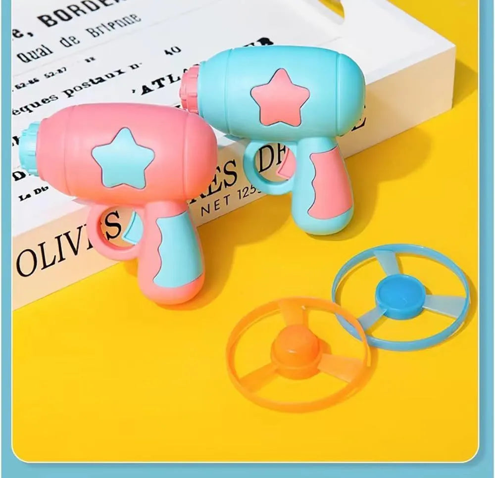 Blue plastic cat toy gun with rotating Frisbee launcher measuring 11cm tall for indoor cat play