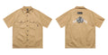 Men's black cotton blend shirt with embroidery detail on front, loose fit with short sleeves