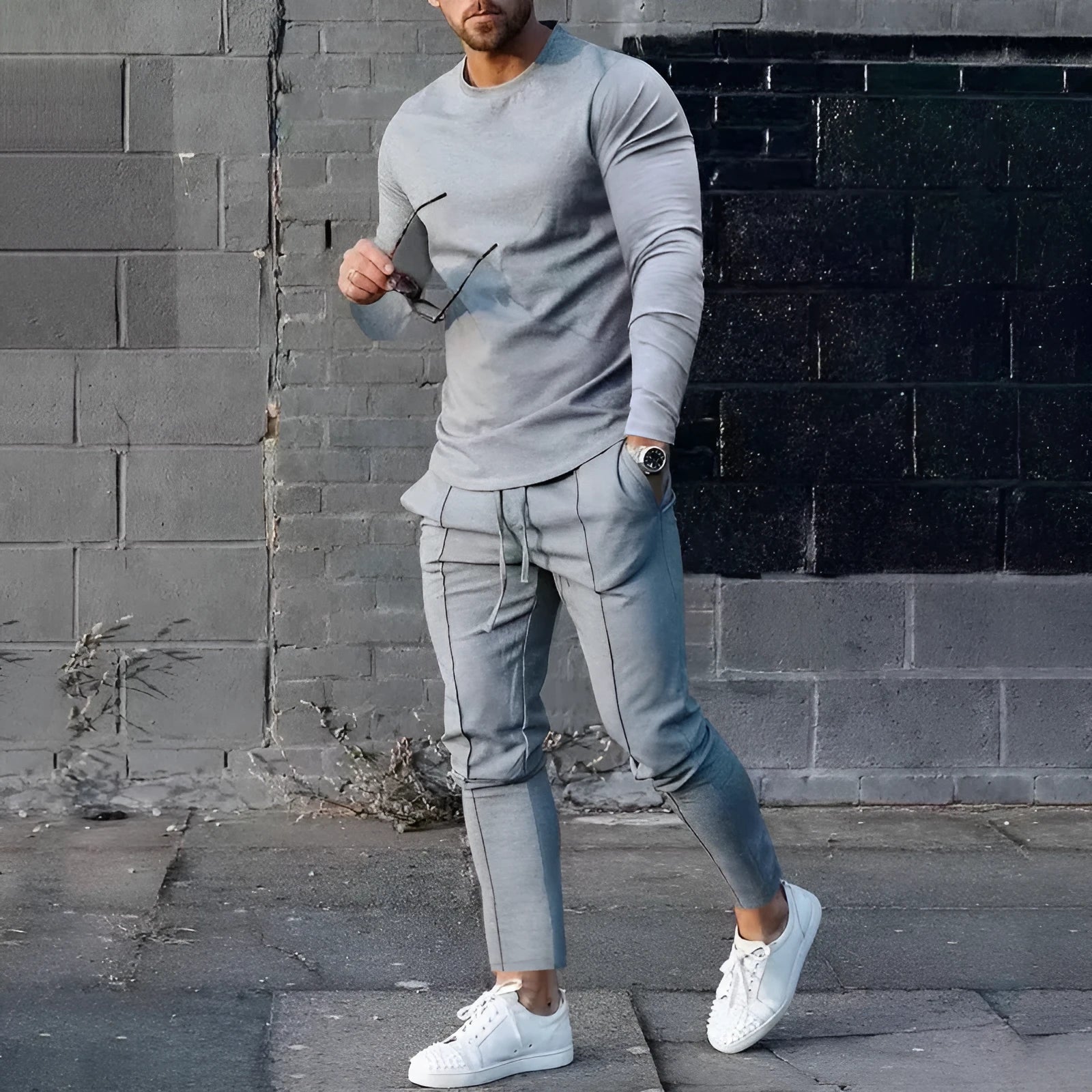 Men's solid colour two-piece polyester tracksuit with long sleeves, shown in apricot colour.