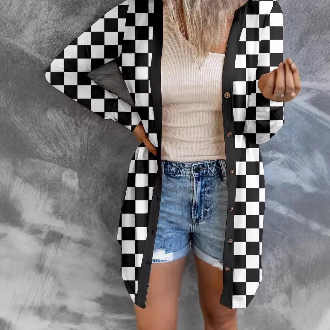 Women's long grey plaid knitted coat cardigan with contrasting colour blocks, loose fit, and regular sleeves.
