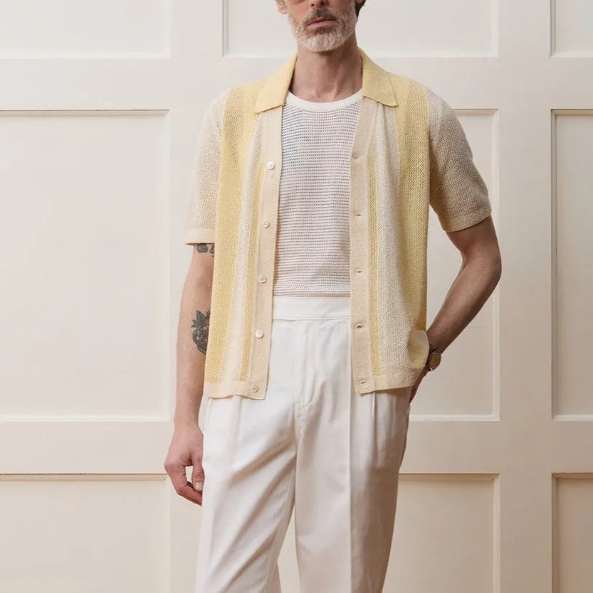Yellow casual polo shirt with hollow-out pattern and asymmetric design, short sleeves