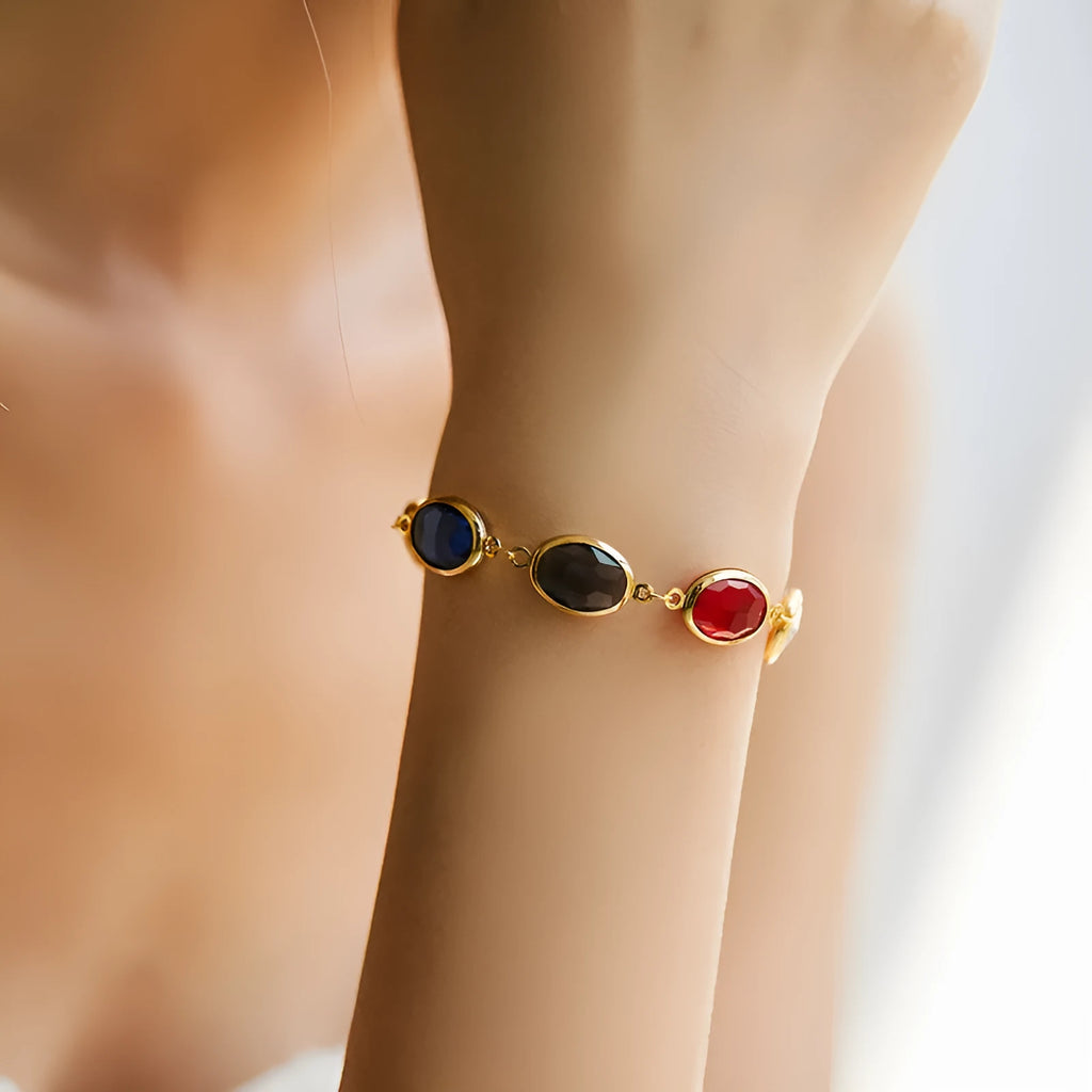 Women's geometric bracelet with elliptical glass inlays on 18K gold-copper framework