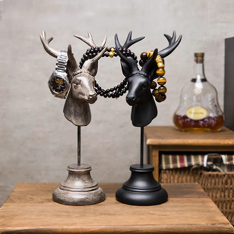Tall black natural resin animal sculpture decoration on a wooden shelf.