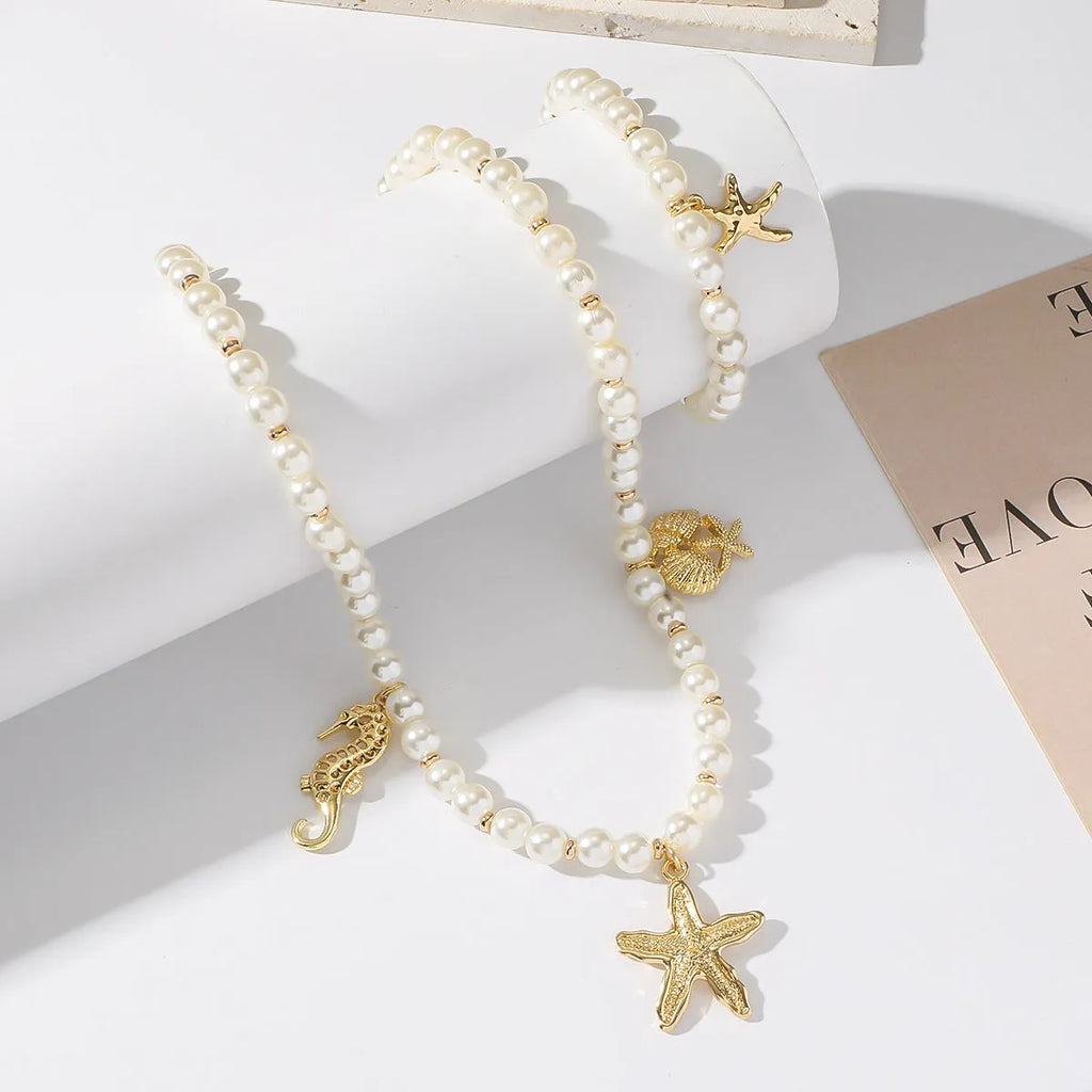 Haima handmade shell necklace starfish bracelet set with alloy pearl chain silver tone unisex