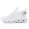 Kids black coconut sneakers with Velcro strap on a breathable fabric upper