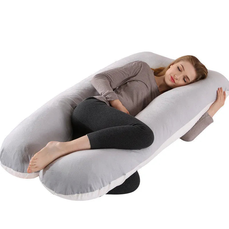 Large U-shaped pregnancy support pillow with removable cover in choice of fabrics.