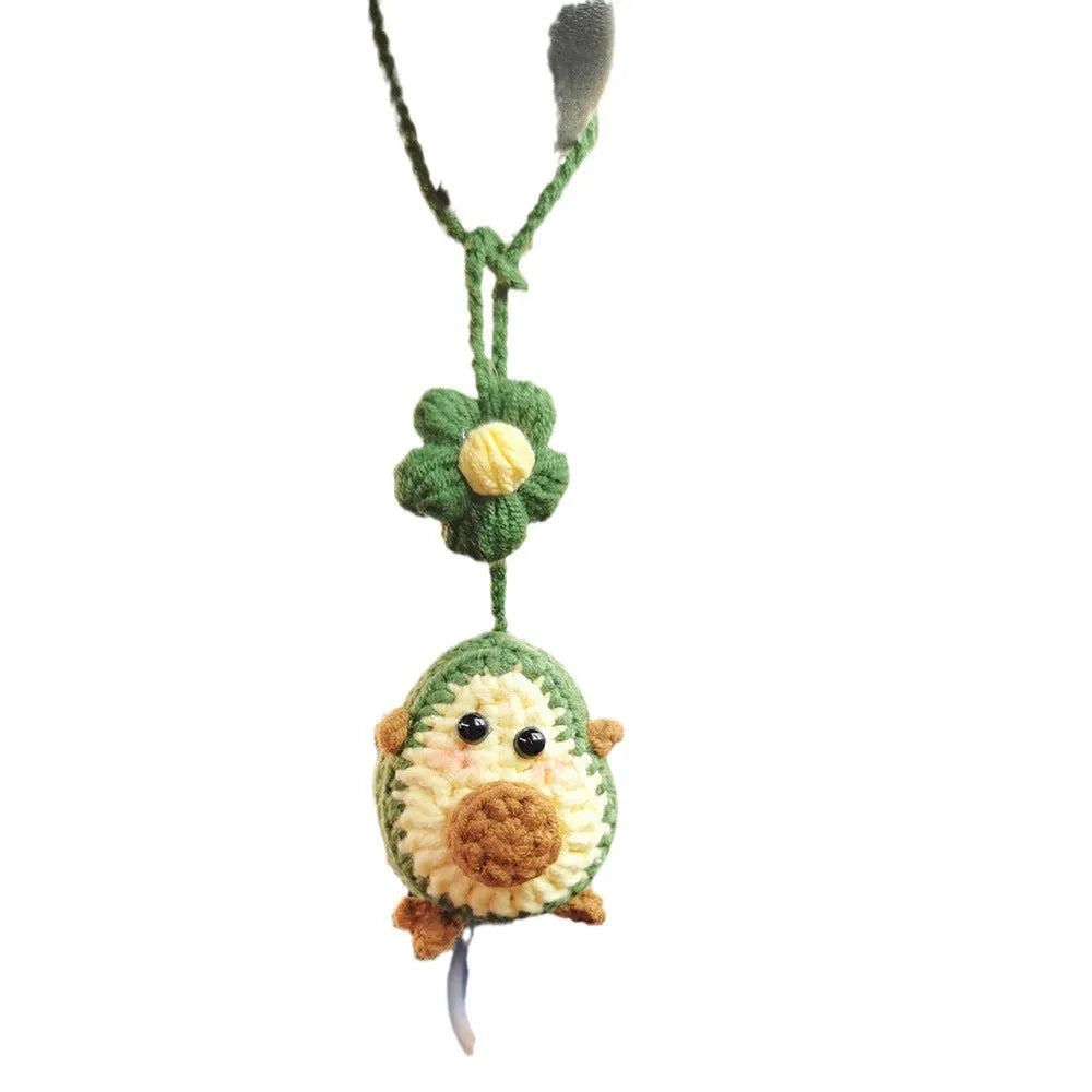 Handmade crocheted avocado rainbow flower car pendant in wool with cartoon styling