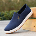 Men's black and blue canvas slip-on shoes with round toe and shallow cutting depth
