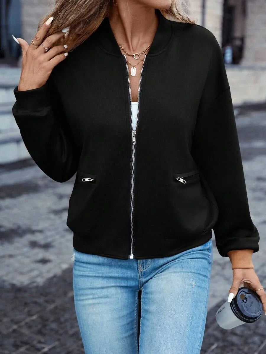 Women's black polyester zip jacket with long sleeves and faux pocket detailing