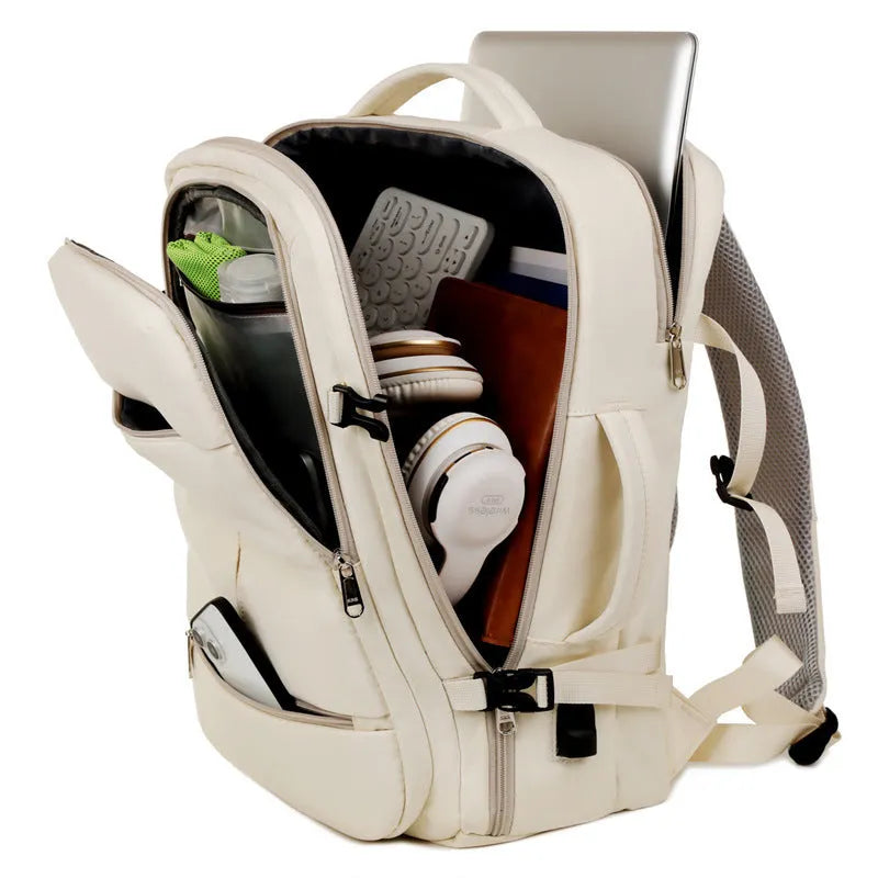 Large waterproof oxford cloth backpack with multiple pockets open to show 15.6-inch laptop compartment