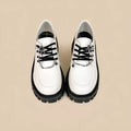 Women's Duke Asterism loafers with a metal cross strap and round toe in preppy style