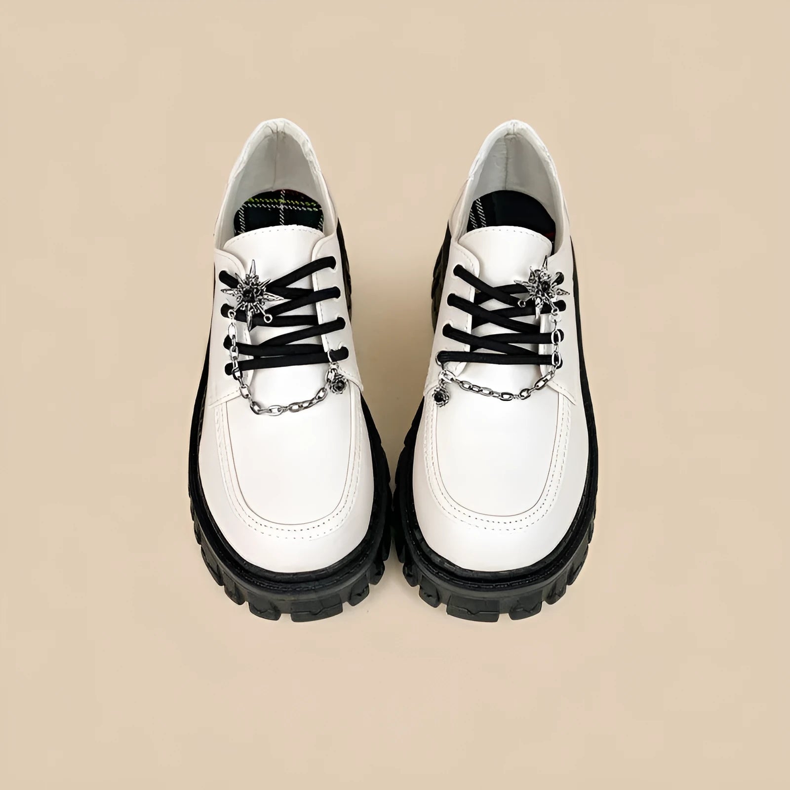 Women's Duke Asterism loafers with a metal cross strap and round toe in preppy style
