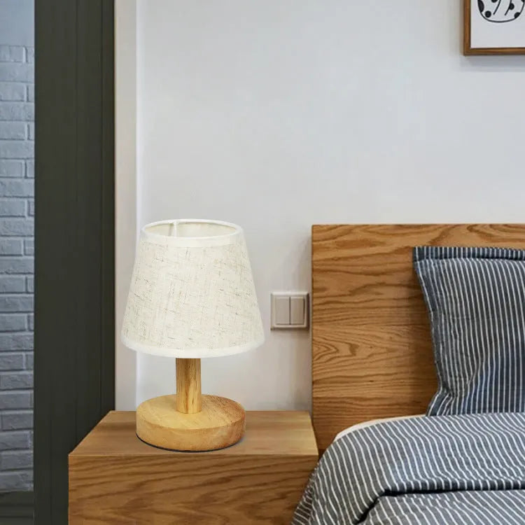Vintage Korean style pleated table lamp with jute and linen shade and bamboo base.