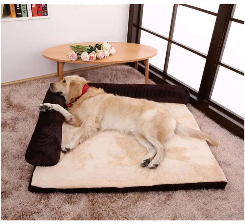 Corduroy bolster dog bed in grey, showing bilateral raised sides and non-slip base.