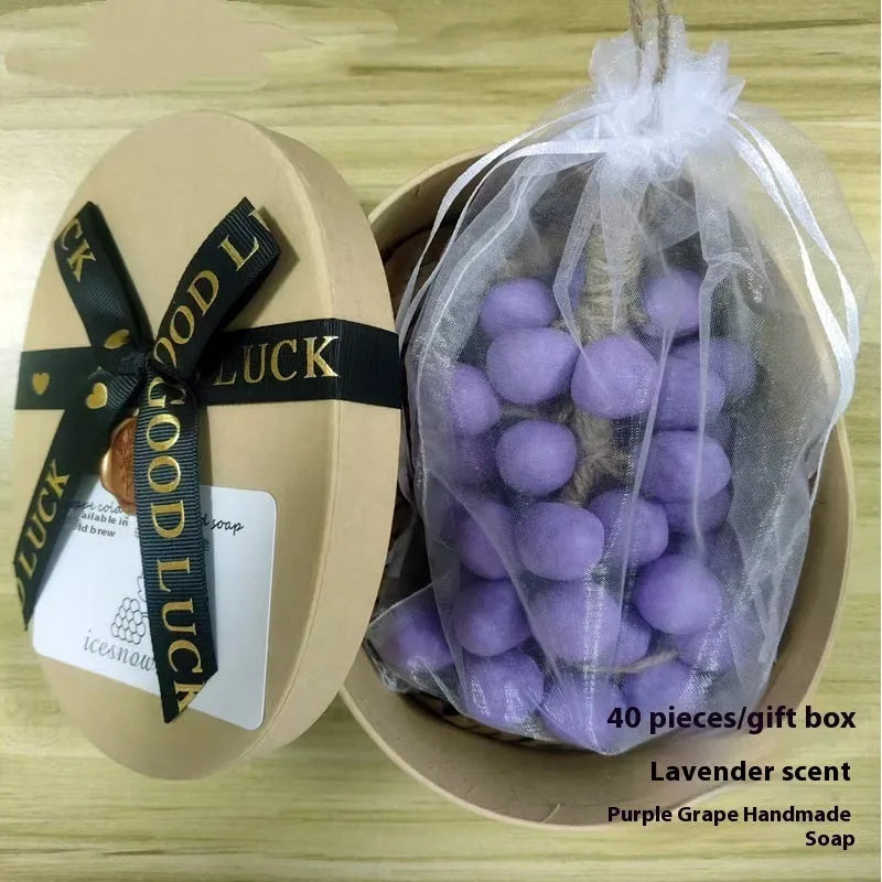 A 120g bar of handmade grape soap with options for black, green, purple, and litchi fragrance.