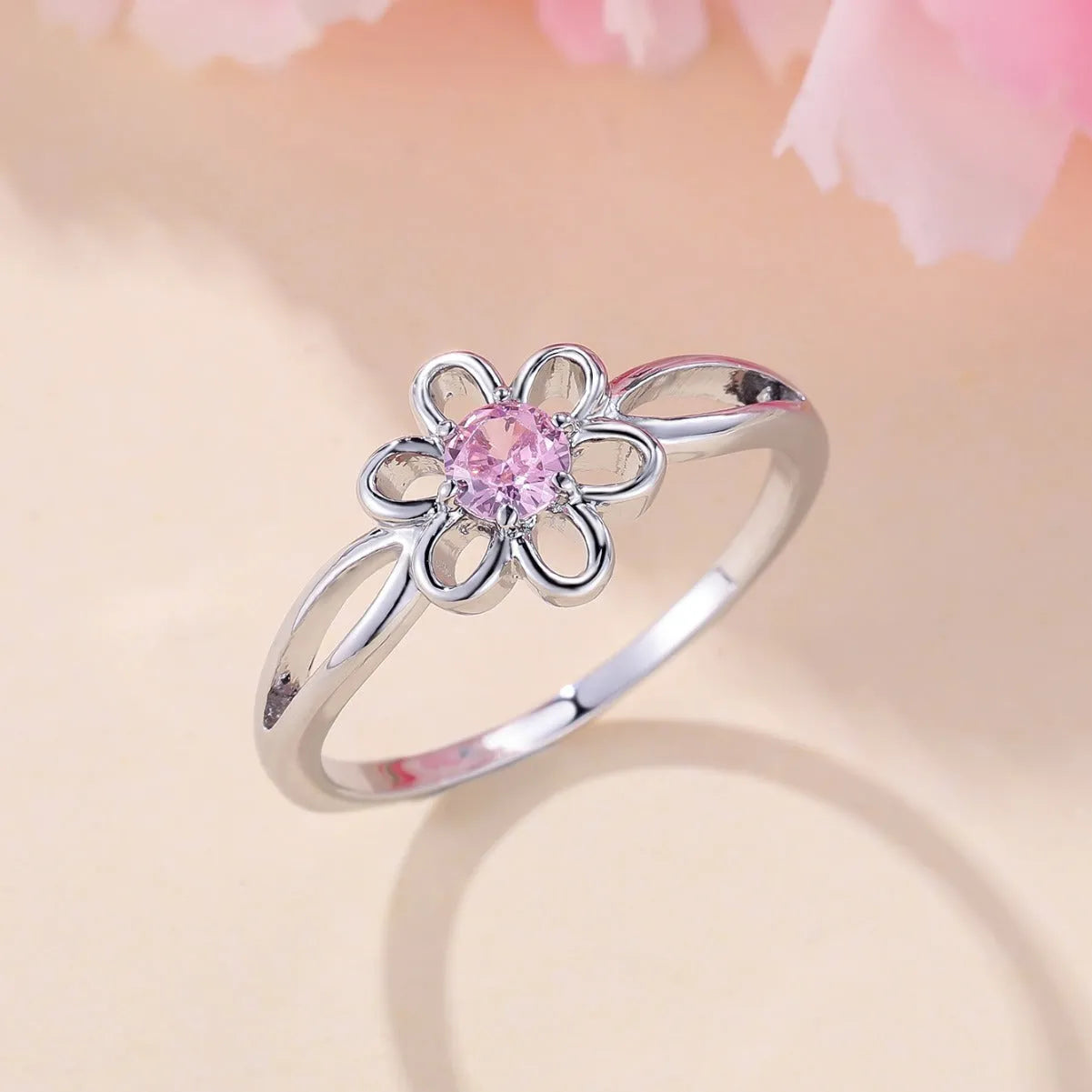 Lady's copper floral hollowed fashion ring with electroplated finish in two colour options