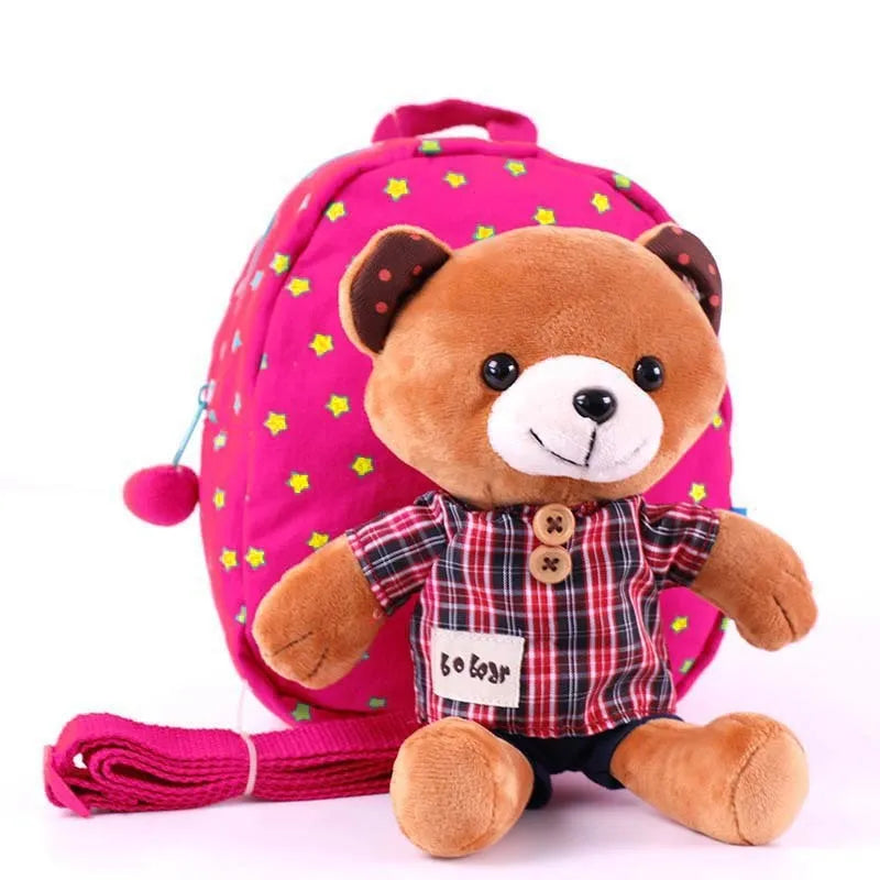 Children's anti-lost cartoon schoolbag in canvas, blue colour, with zipper closure.