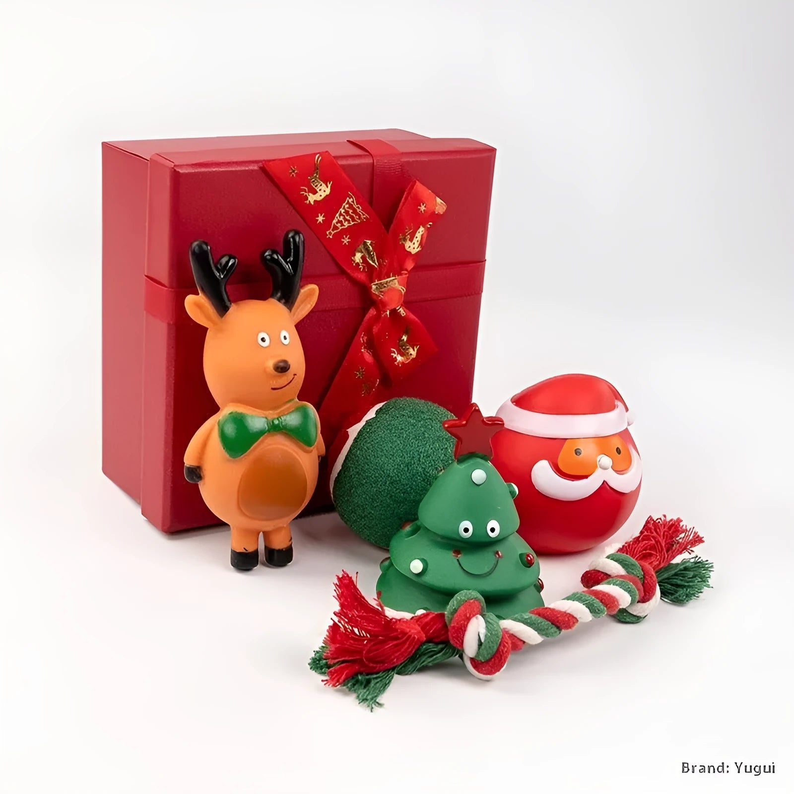 Seven Christmas gift bags containing vinyl dog toys with Santa heads, trees and deer figures