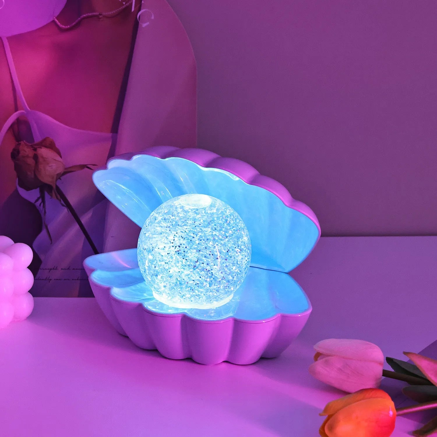 Shell-shaped decorative night lamp with neon ambience lighting in three colour variations