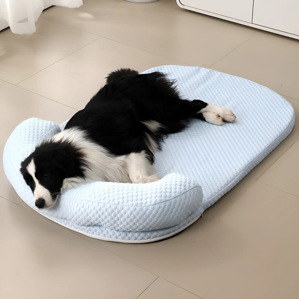 Summer pet cooling mat in blue with breathable ice peas fabric for dogs, shown on a flat surface.