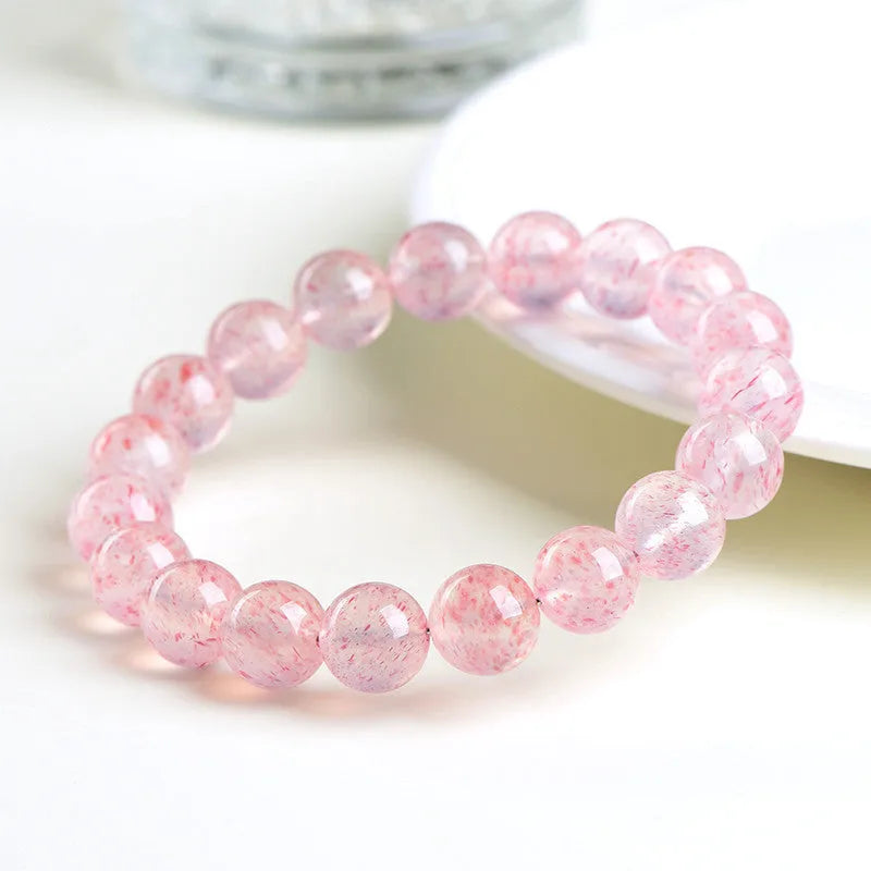 Strawberry quartz crystal bracelet with 10mm round beads and ground finish