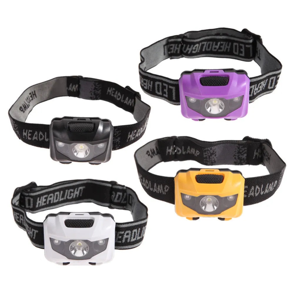 Black LED head torch with adjustable strap, showing white and red LEDs, for outdoor activities.