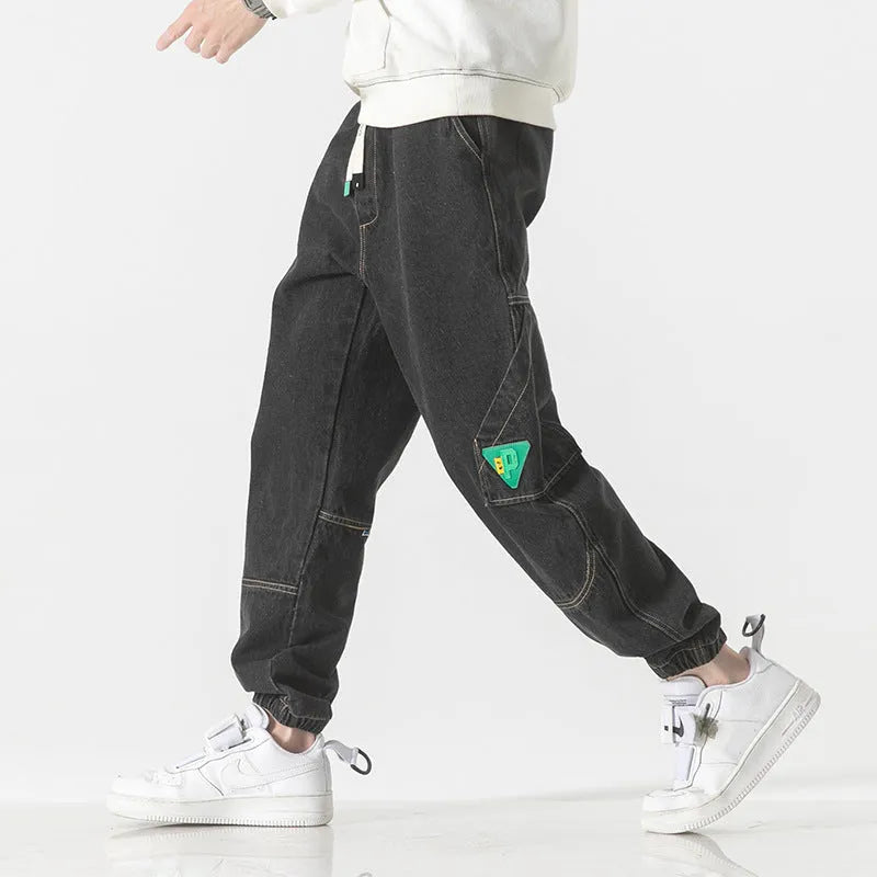 Men's cotton loose-fit tapered trousers in black, blue, or grey with mid-waist design