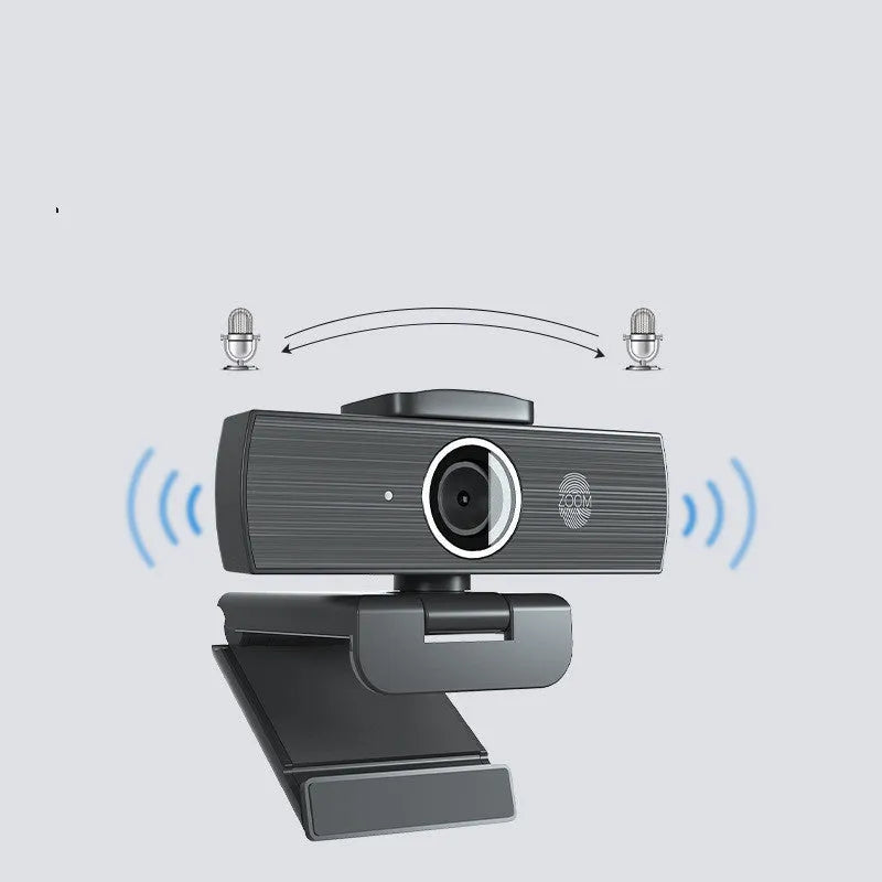 Black USB computer webcam with magnetic privacy cover on a laptop screen