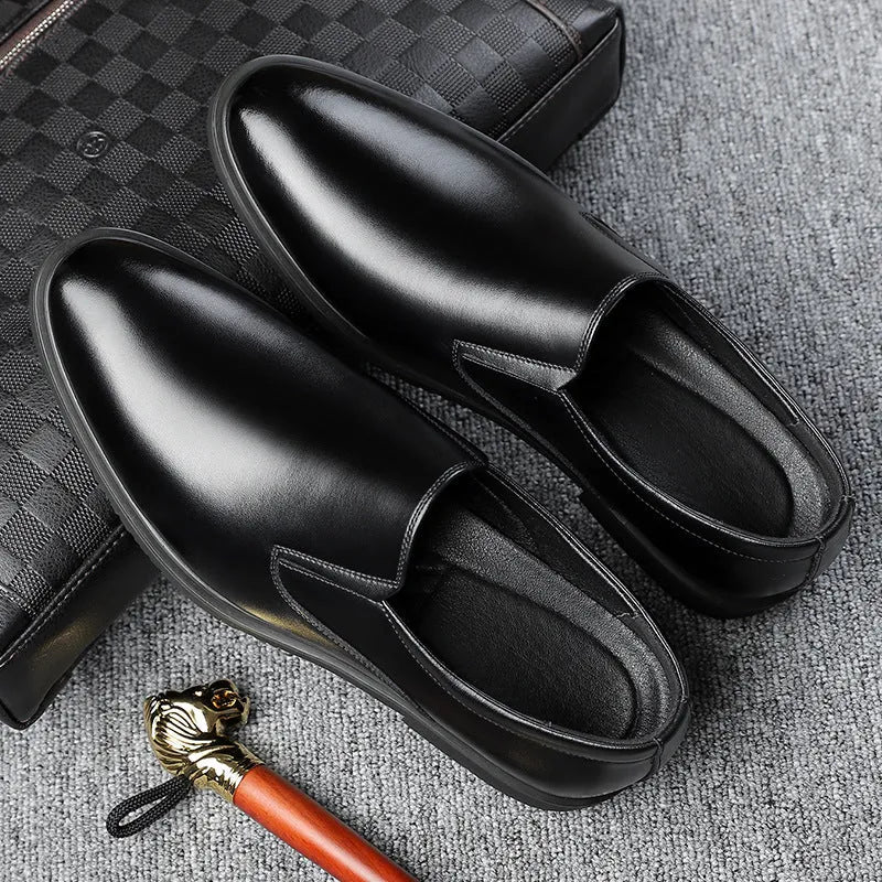 Men's black business casual slip-on shoes with leather toe cap and rubber sole