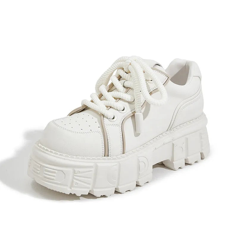 Women's beige leather muffin bottom casual slip-on shoes with a rubber foam sole.