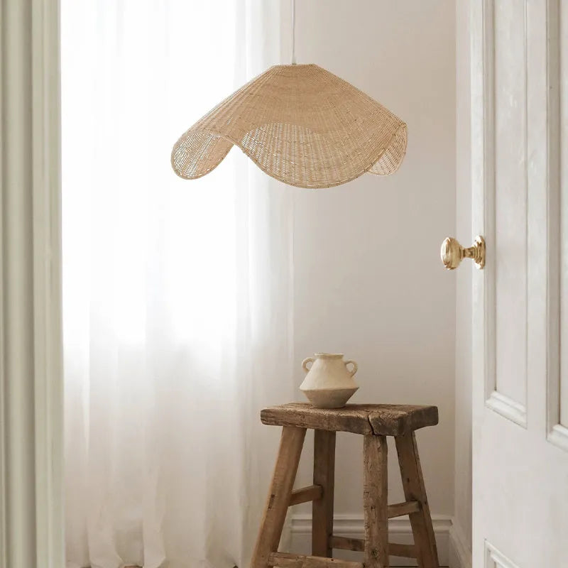 Handwoven straw rattan and willow bamboo pendant ceiling lamp with warm white LED light.