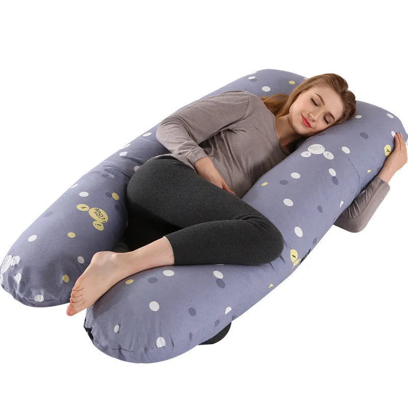 Large U-shaped pregnancy support pillow with removable cover in choice of fabrics.