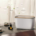 GX-22K white household atomiser humidifier and diffuser with night light on a wooden table.
