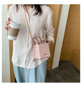 Women's small bucket-shaped chain messenger bag in multiple colours with zip closure