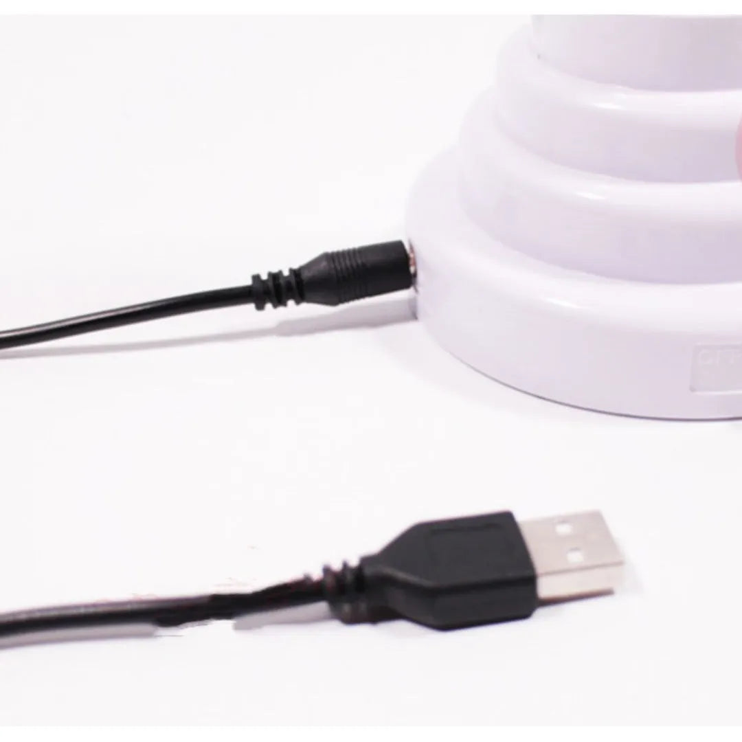 Minimalist bamboo-shaped white and green desktop lamp with USB cable in two size options.