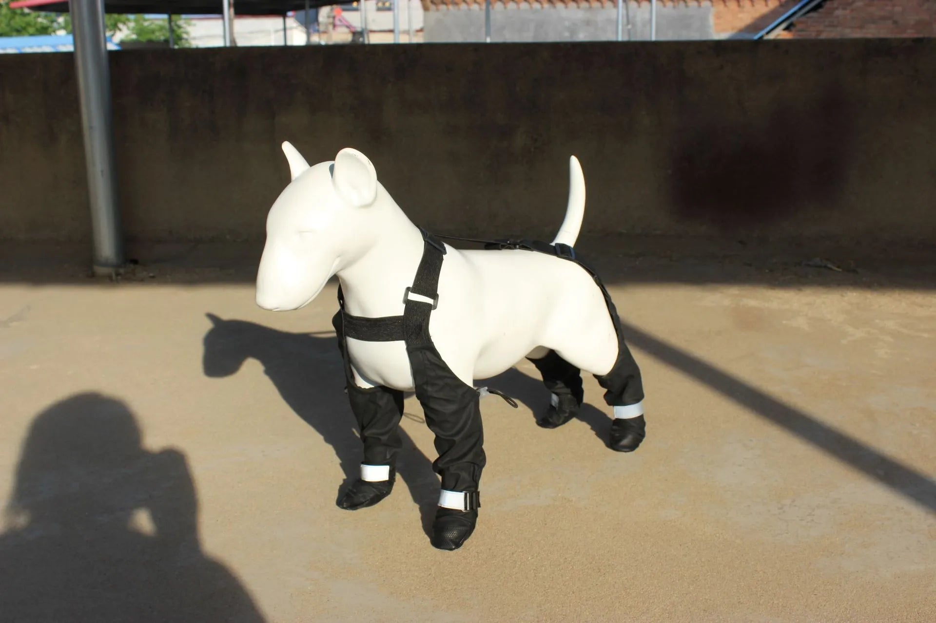 Black waterproof non-slip dog shoes or paw protectors for small to large breed dogs.