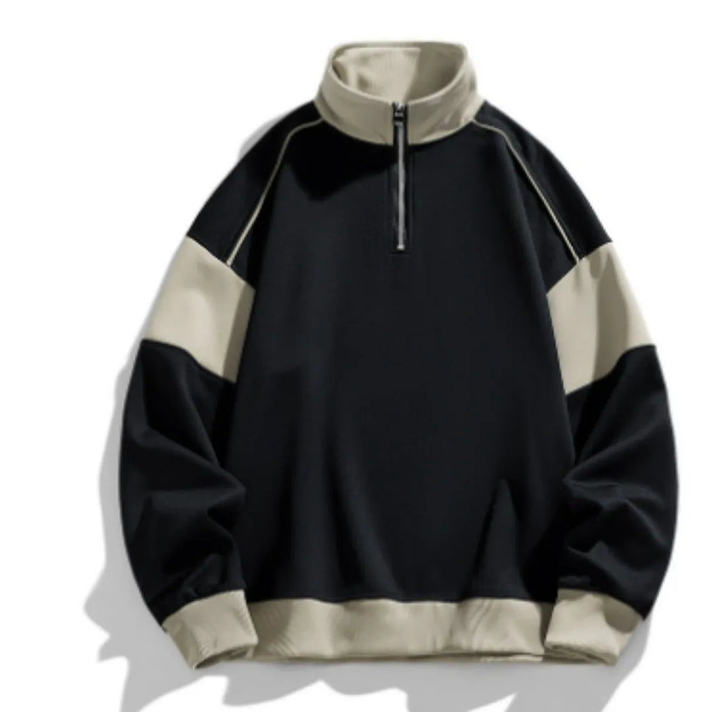 Man wearing a beige corduroy drop shoulder hoodie with loose lapels.
