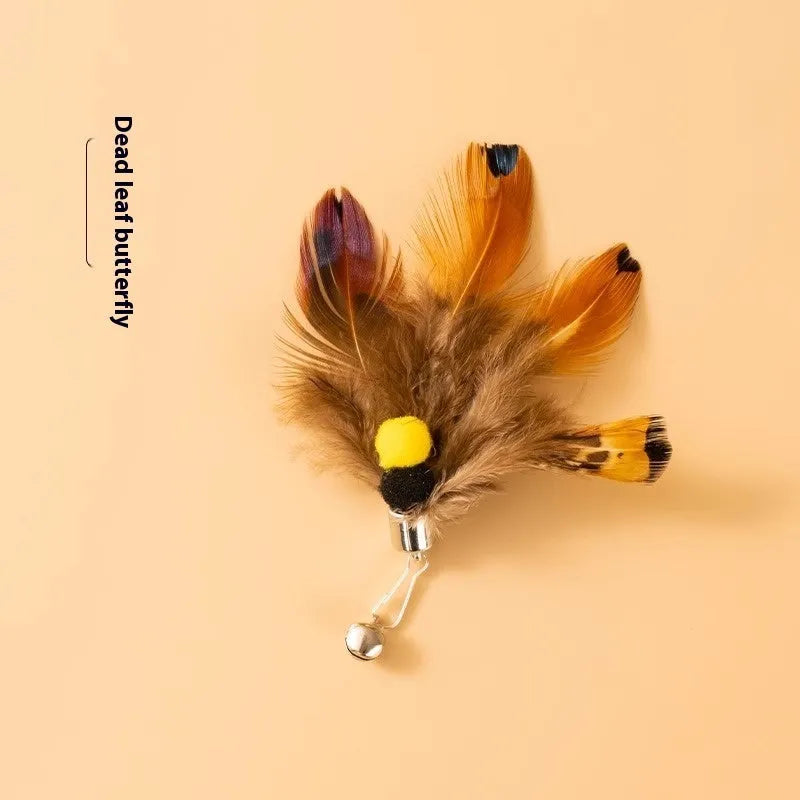 Three steel wire cat toy replacement heads with flying insect designs in distinct colour combinations
