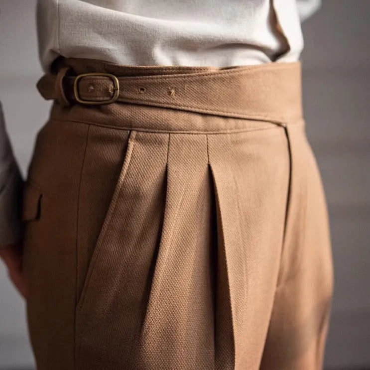 Man wearing black high-waisted straight-leg casual polyester trousers.